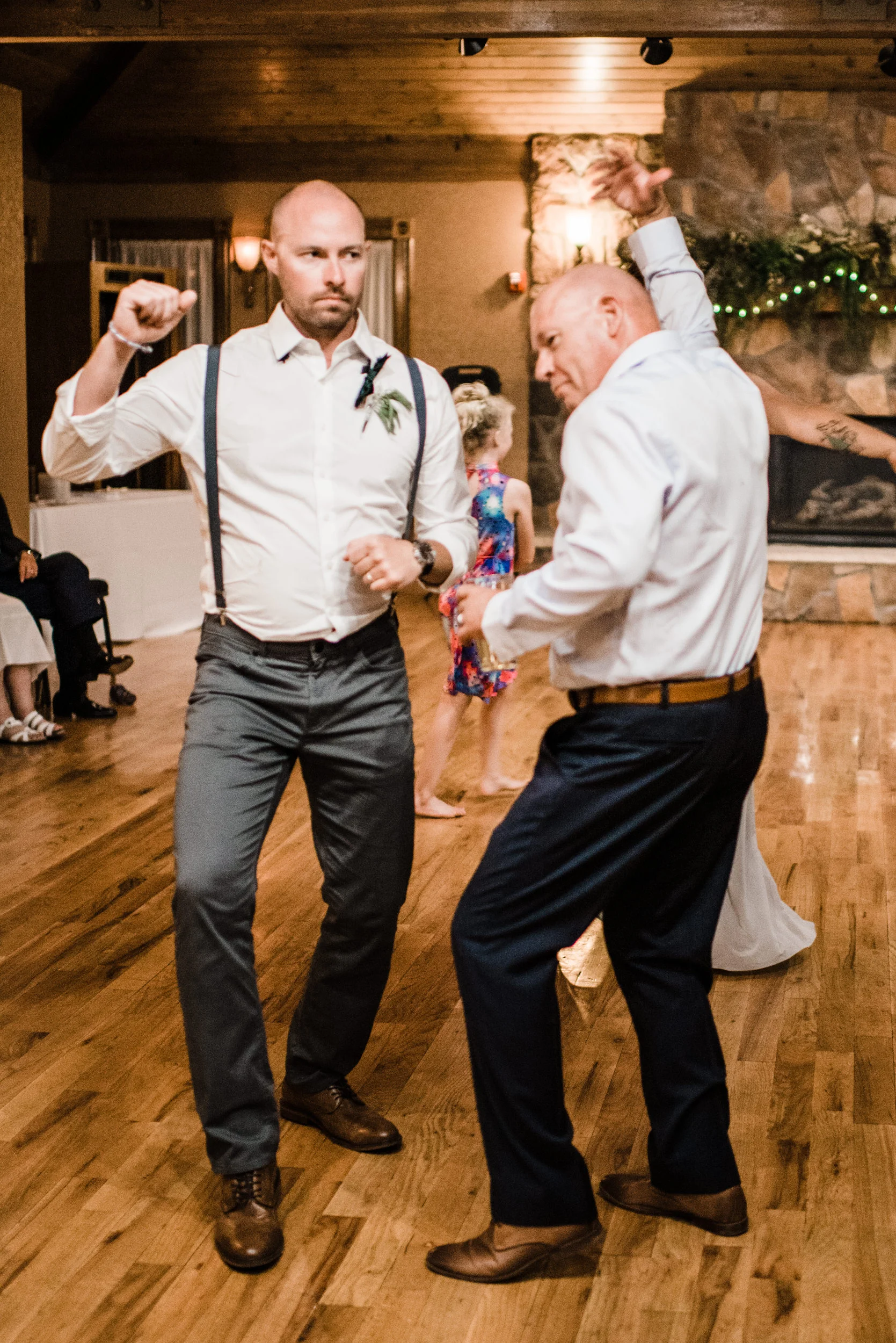 Colorado mountain wedding photographer at Brookeside Gardens wedding reception people dancing and having a good time