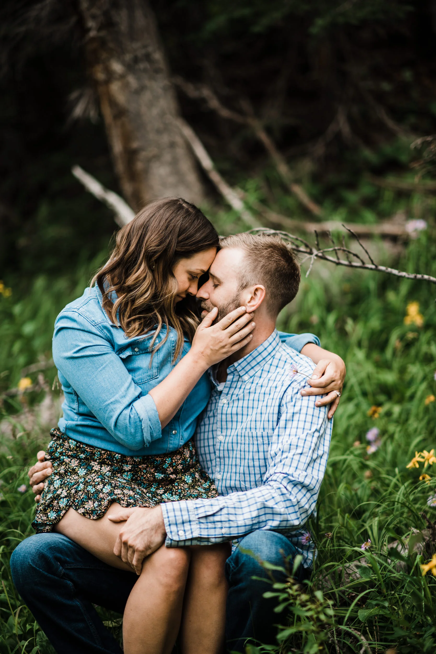 Indian Peaks-Brainard Lake-Colorado Engagement Snuggled in Field