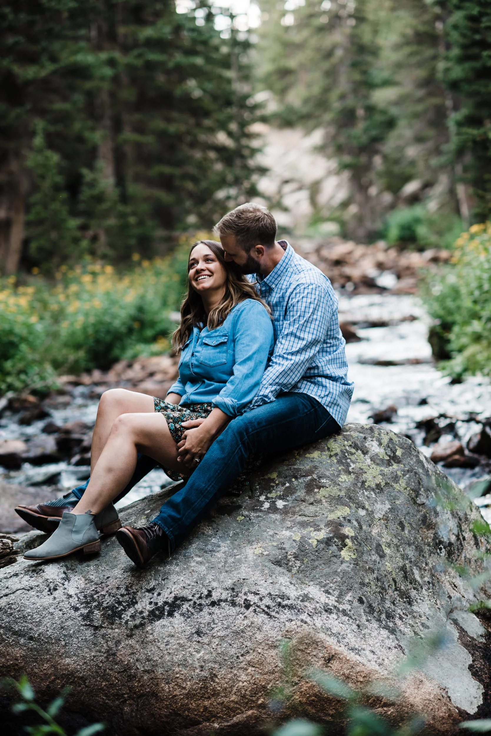 Indian Peaks-Brainard Lake-Colorado Engagement snuggles by the river
