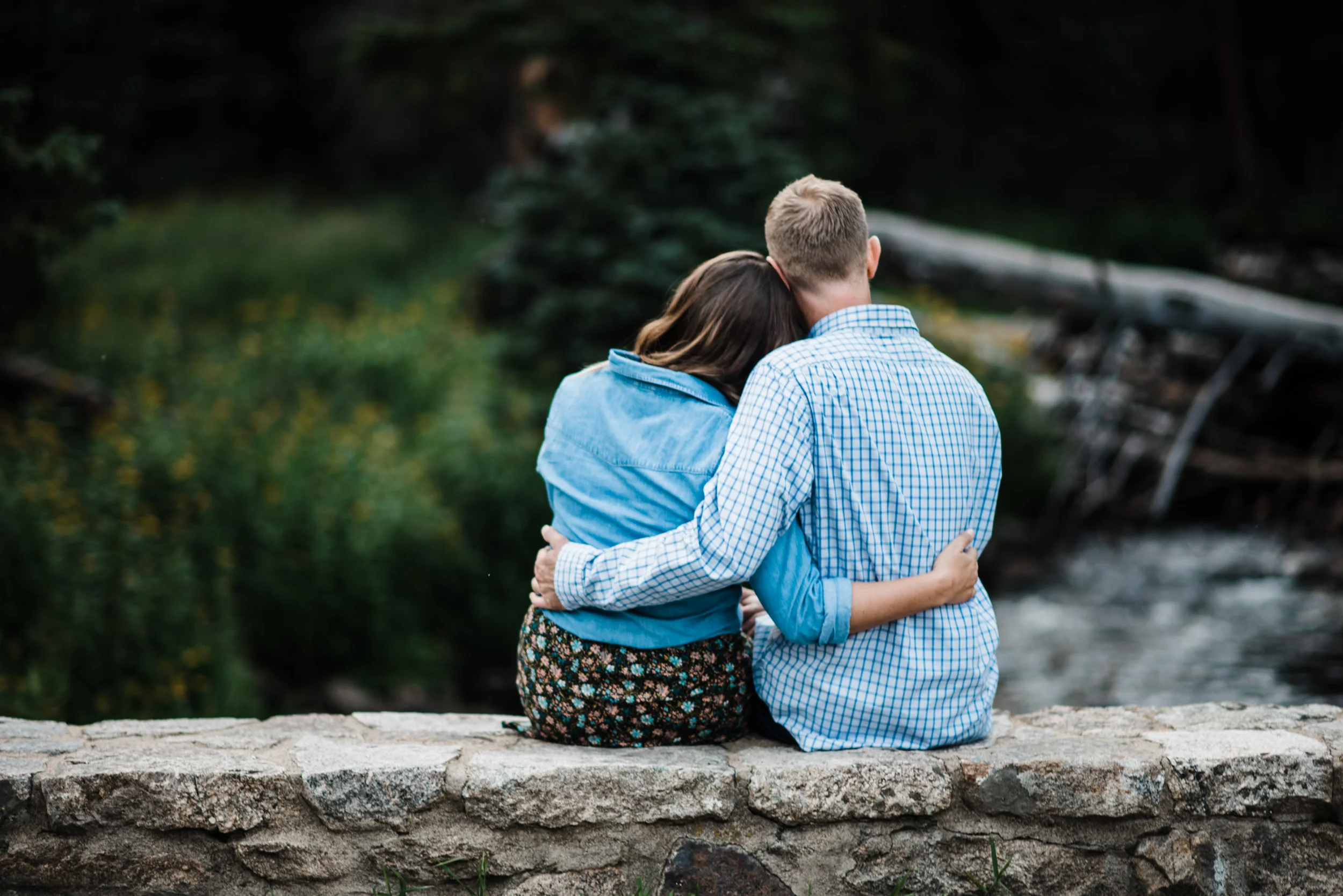 Indian Peaks-Brainard Lake-Colorado Engagement snuggle by the river
