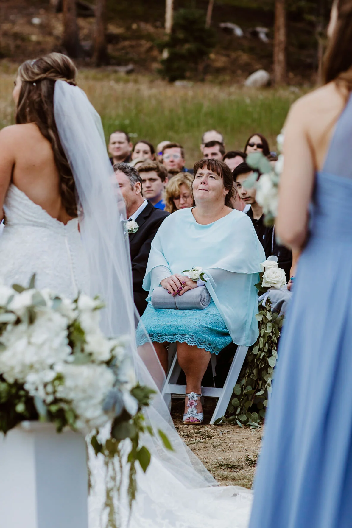 Bride and Groom at ceremony at TImber Ridge at Keystone, Colorado mountain wedding