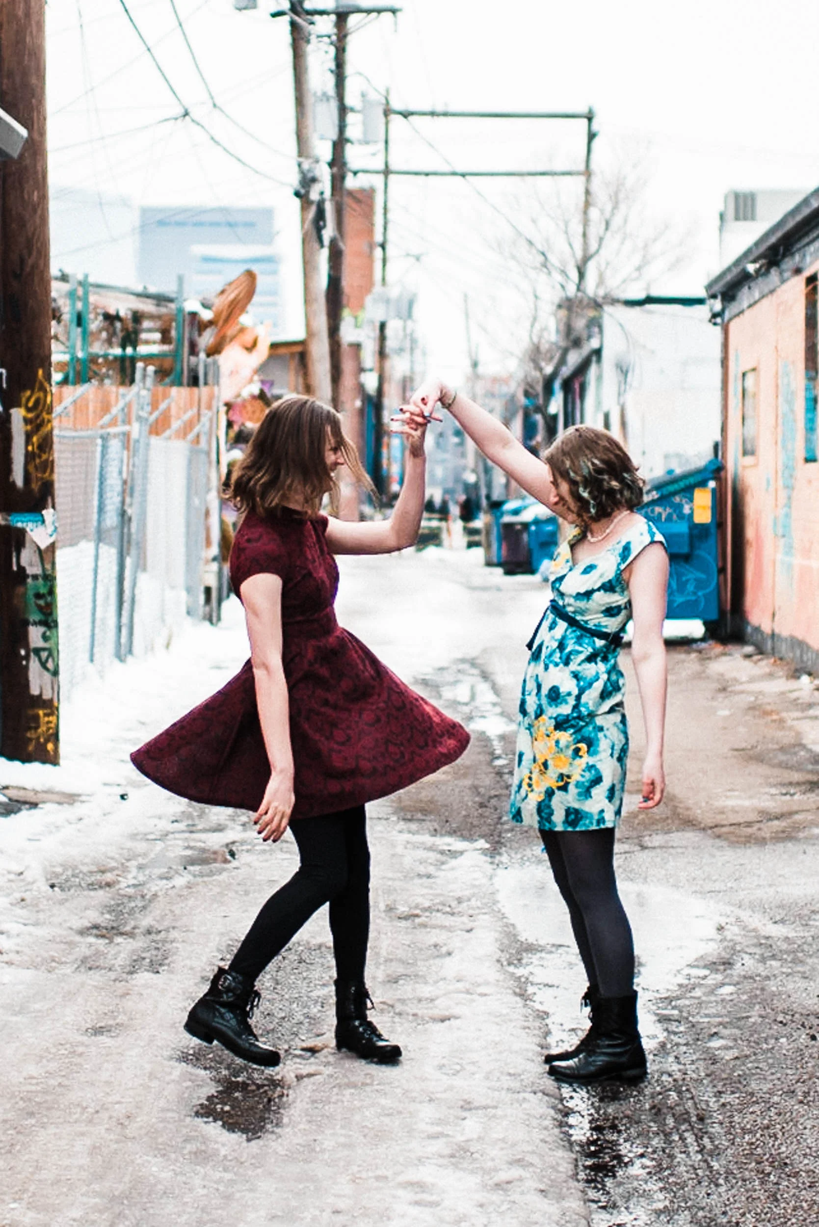 Dancing in the alley Denver Colorado RiNo art mural, RiNo Arts District, RiNo engagement session, LGBT wedding photographers, LGBT friendly wedding photographers, LGBT engagement photographers, Denver wedding photographers, Denver Engagement photographers
