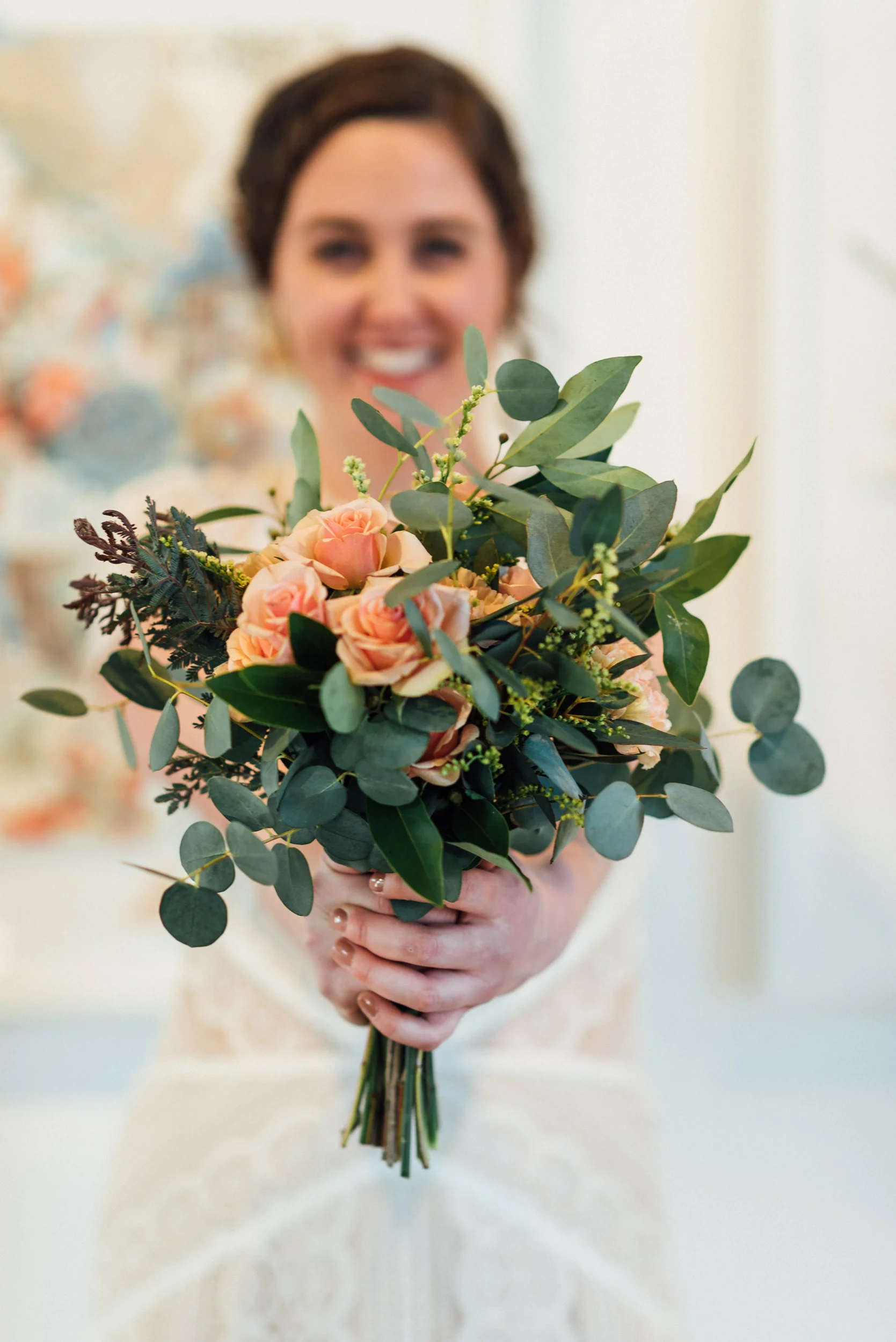 Bride at Space Gallery with her gorgeous flowers-Space Gallery Wedding Photographer