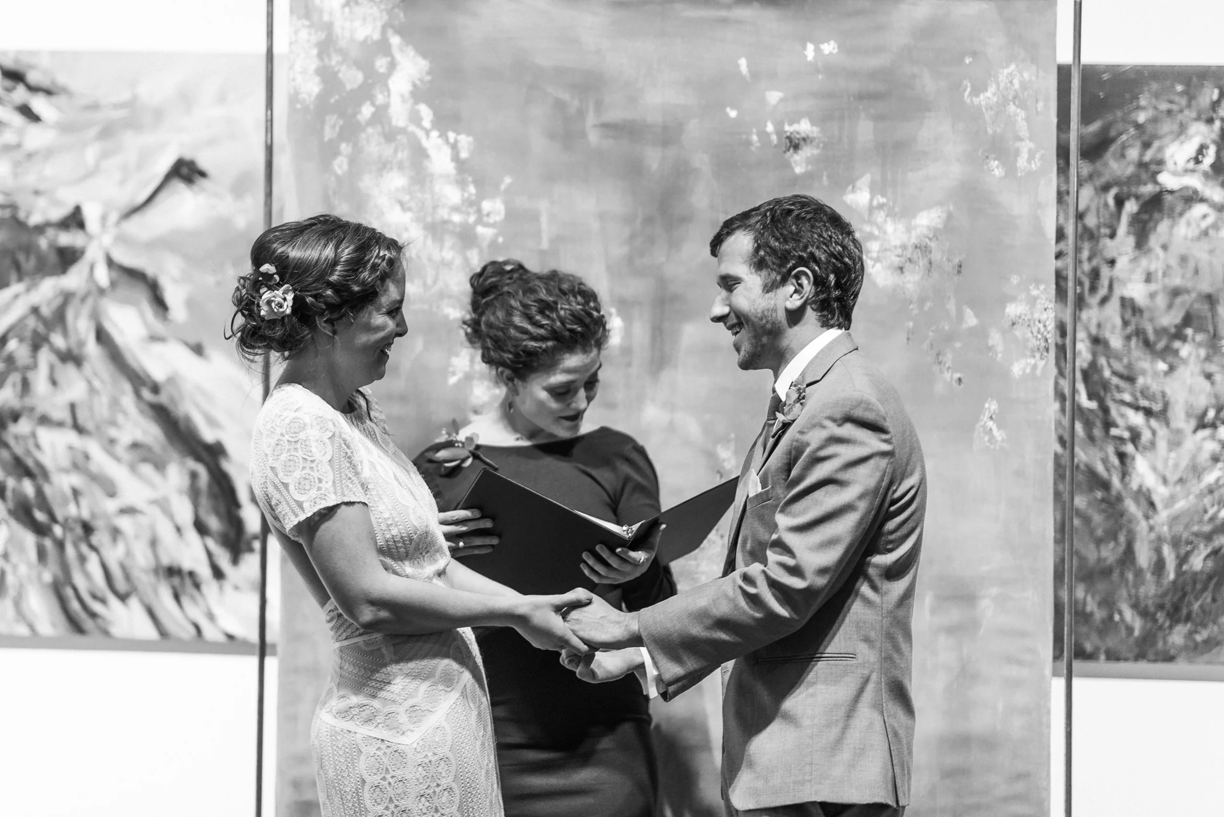 Bridge at Groom laughing and having fun at their Space Gallery wedding ceremony-Denver Wedding Photographers