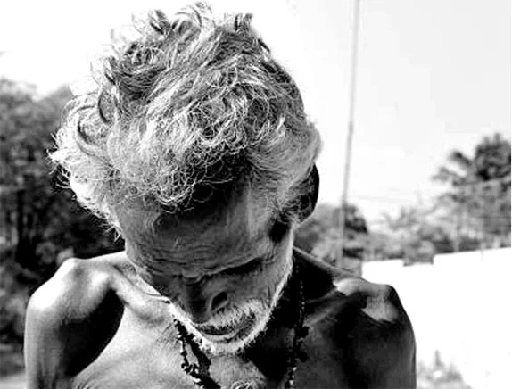 older man looking down b&w best smaller.jpg