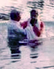 Sayujya being baptised