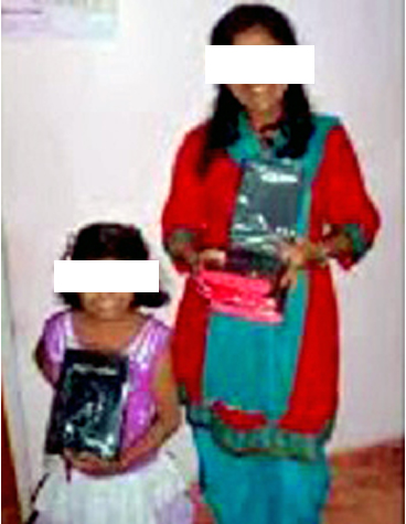 Sayujya with bibles for further distribution