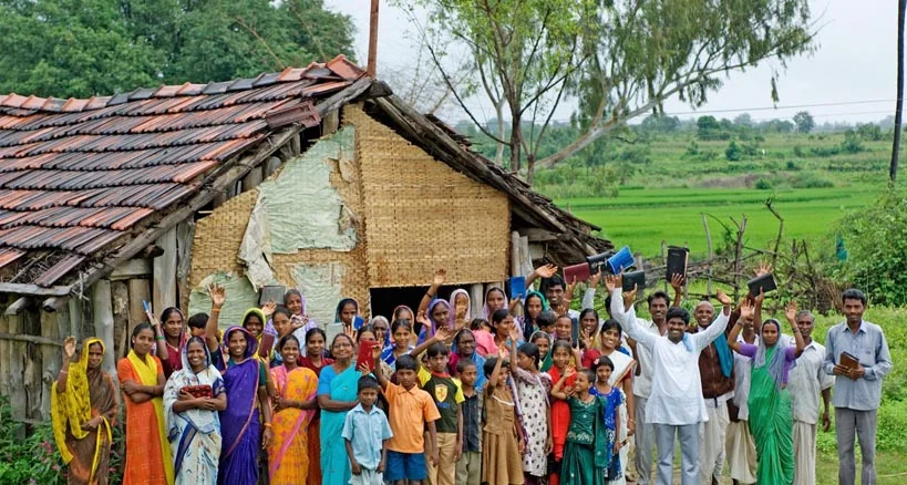 in another part of south Asia, worshippers gather outside their own 'house church'