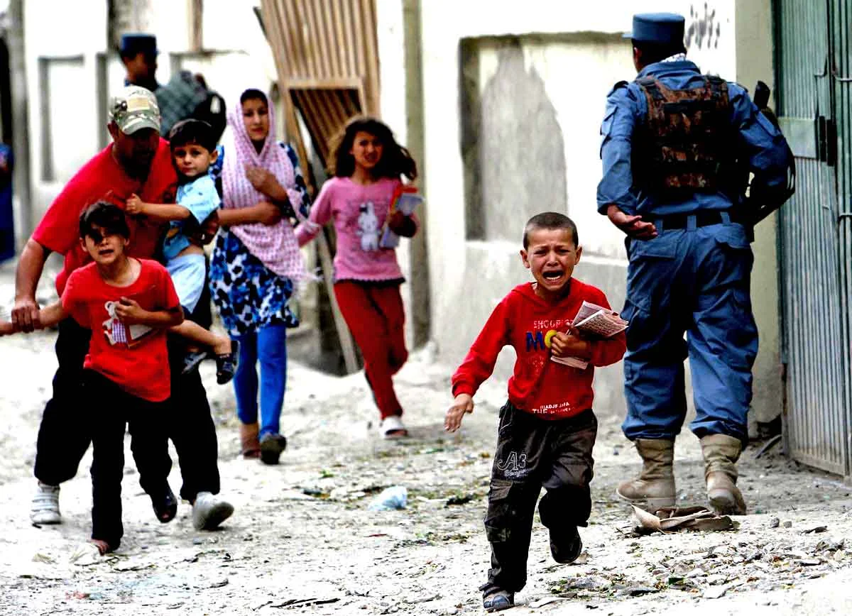 Atrocities in Afghanistan continue; here, Children run away after an explosion in Kabul in May, 2013 (REUTERS)