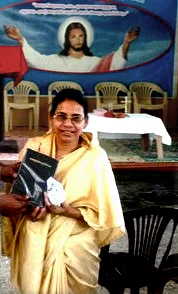 Chandra Devi recieving her new Bible