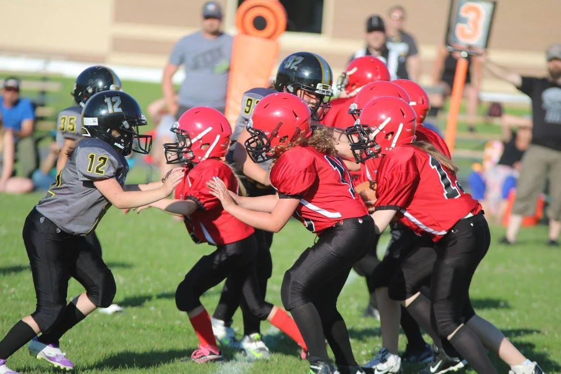 Junior girls only tackle football equipment fitting