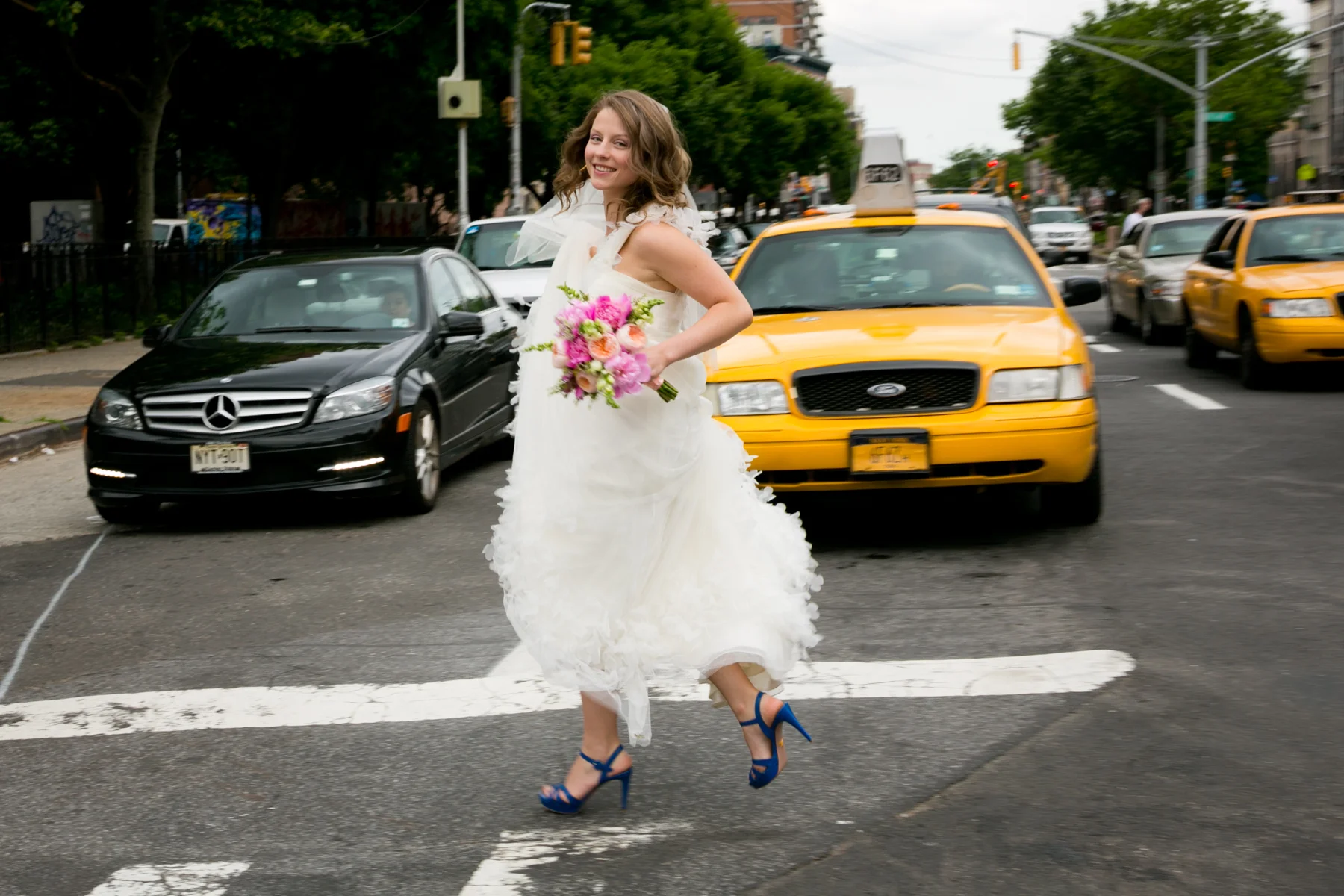 Running to the ceremony at St. Stanislaus Church in the East Village, Manhattan
