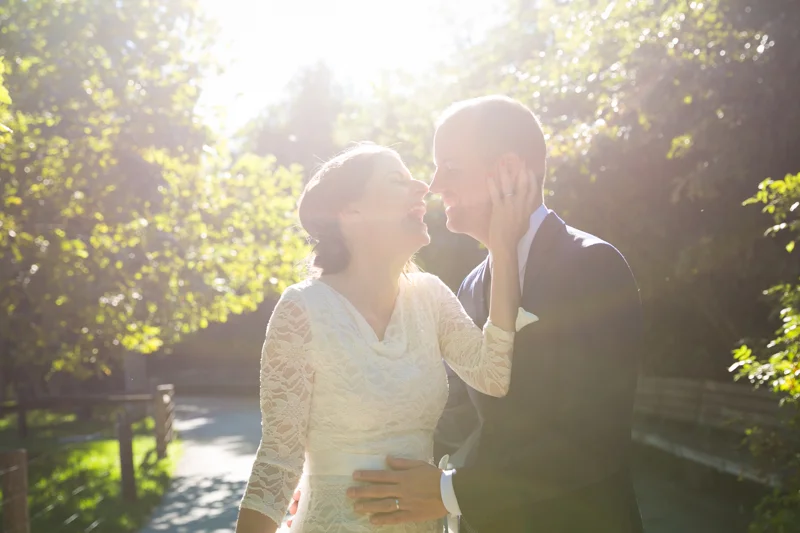 Couple laughing in sunlight