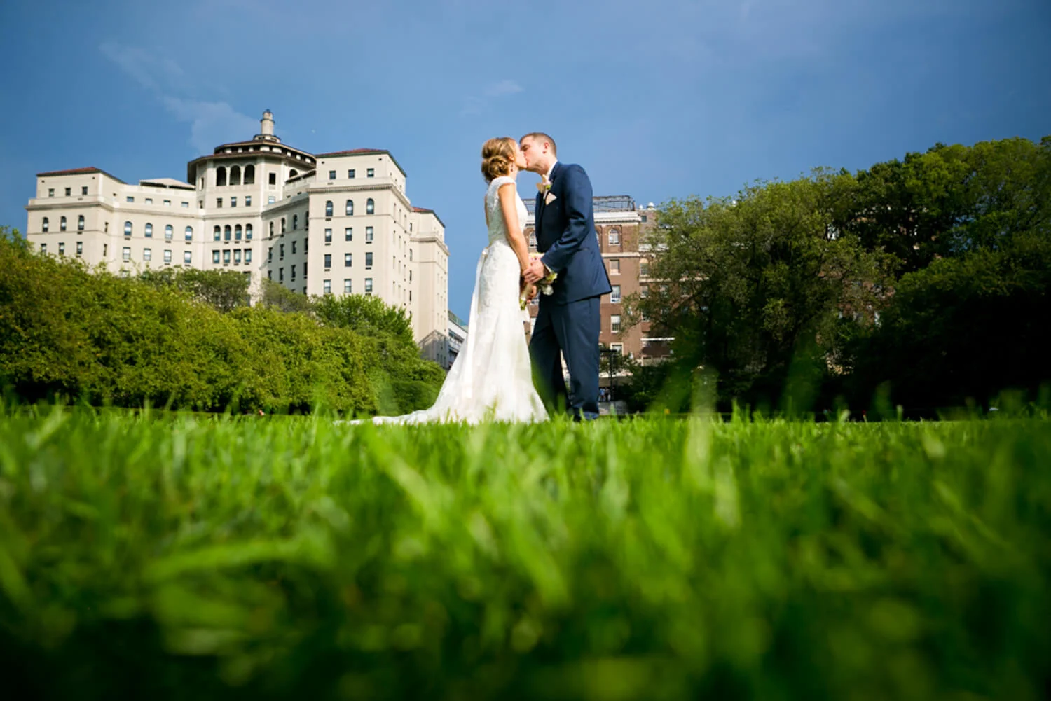wedding photo on green lawn at Central Park Conservatory Garden