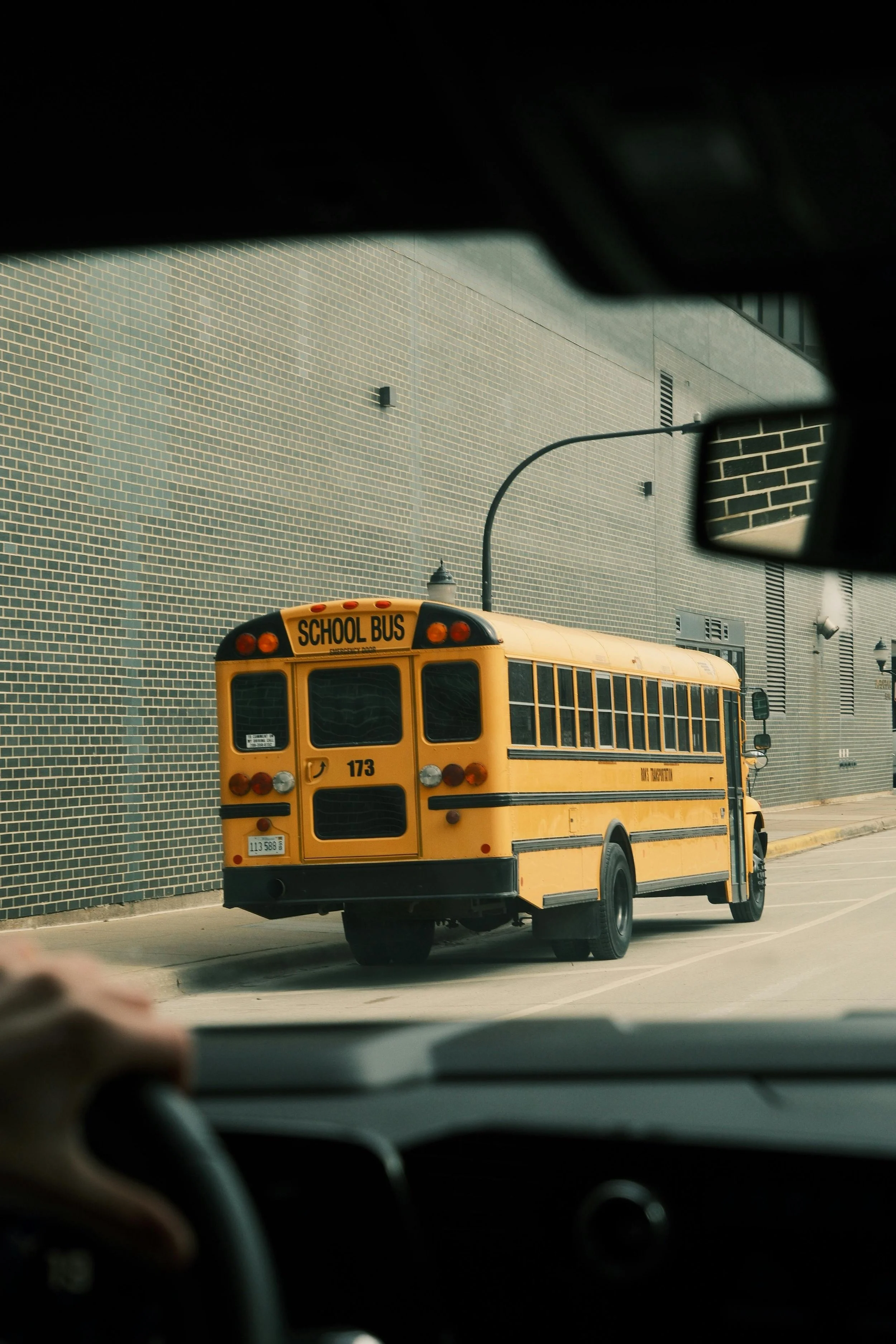 How many points do you get a ticket for not stopping for a school bus, and what should I do?