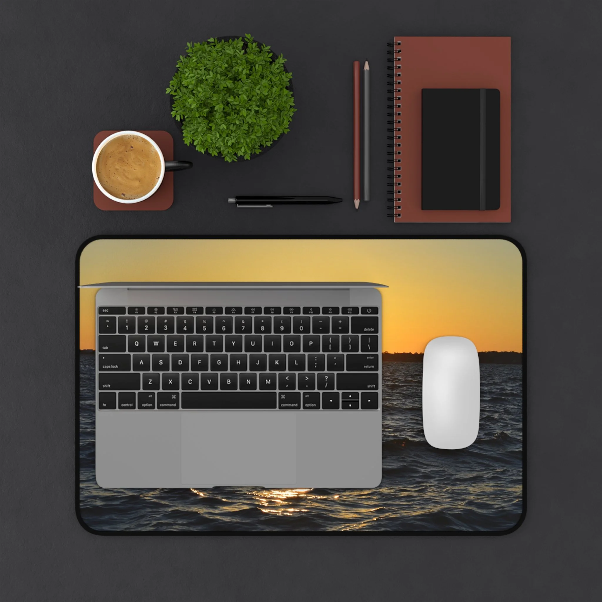 "Sunset over calm ocean waves, golden light reflecting on water — printed on a high-quality desk mat from The Abyss Collection"