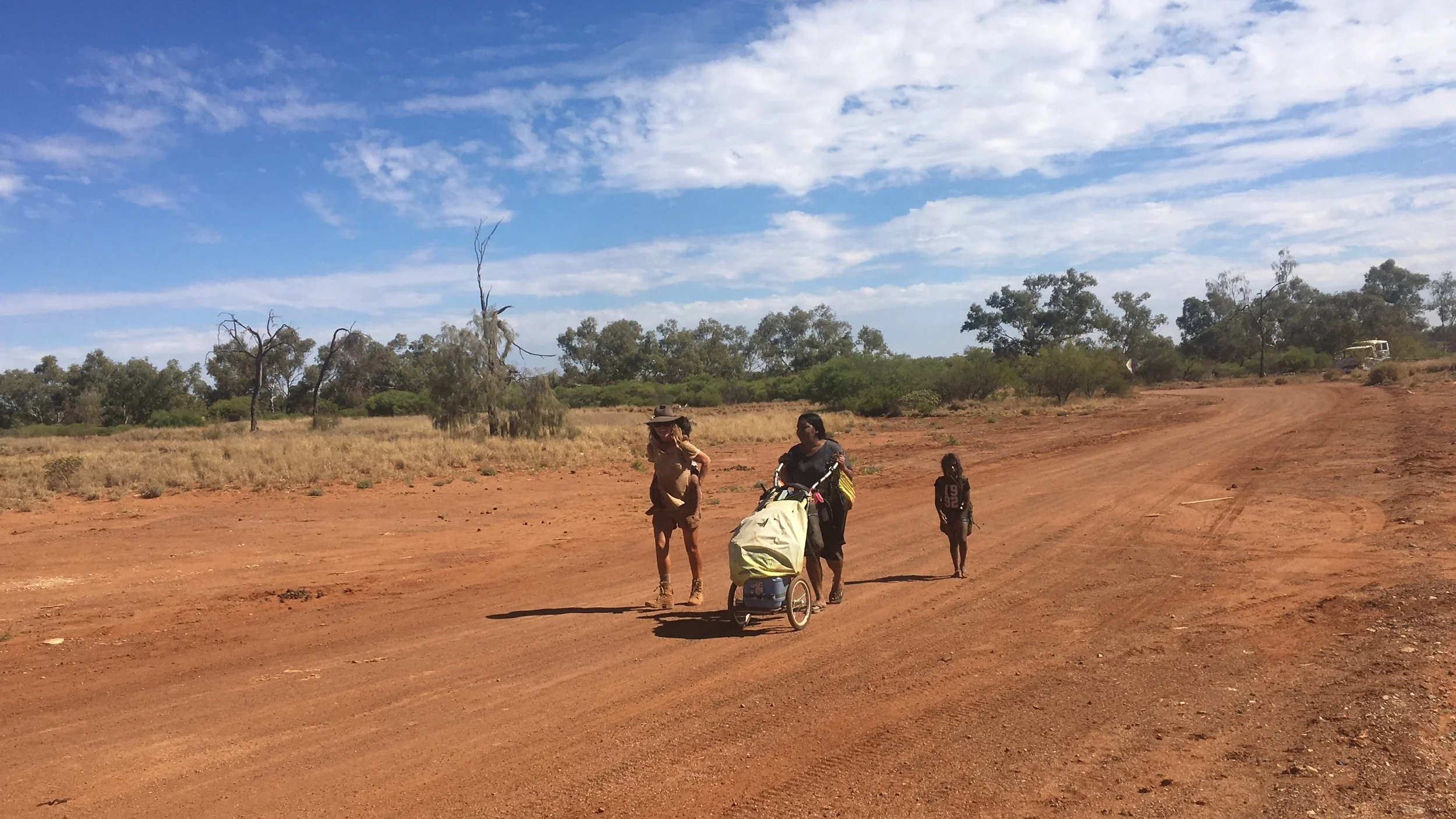 Walking into Jigalong with Maria, Molly's daughter
