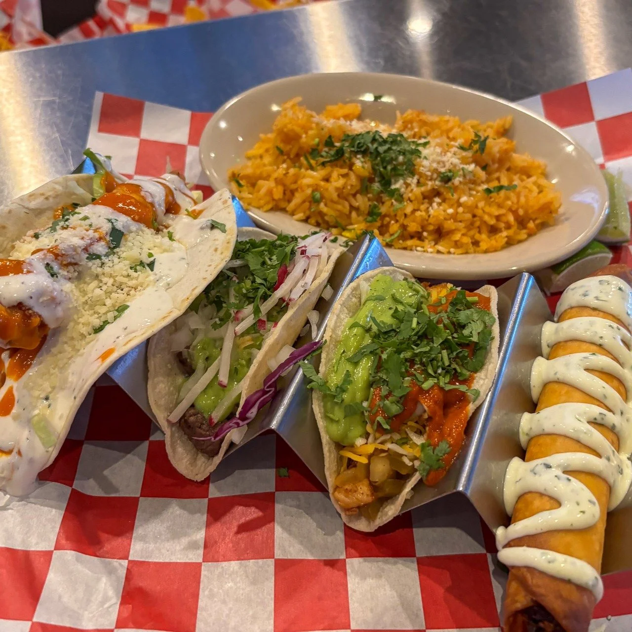 Try our Taco Sampler! Choose any 3 signature tacos + 1 shredded beef taquito
// signature taco selections: pork adobada, tejano smoked short rib, spicy buffalo chicken, chicken al pastor, carne asada, baja fish, portobello mushroom