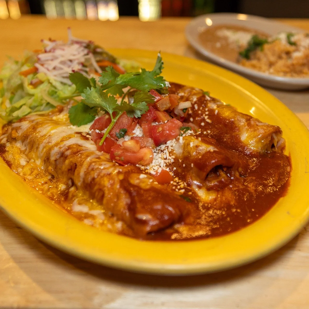 Hungry? Solution: Order three Chicken Enchiladas with melted jack + cheddar cheese, smothered in red or green chile sauce. #parkcityfood #comfortfood
