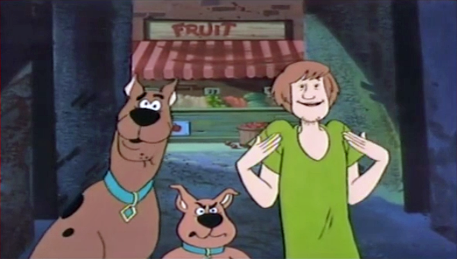  Scrappy stands his ground while Shaggy explains that some of his best friends are vampires. 