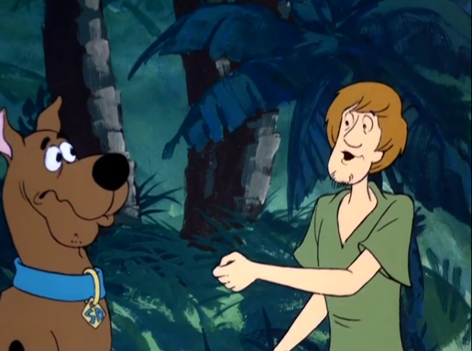  Shaggy performs a magic trick with an invisible coin. Either really impressive or not at all, depending on how you look at it. 