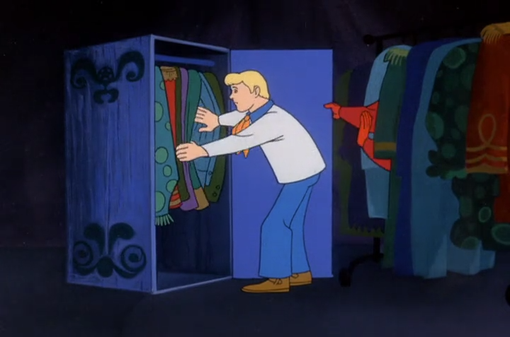  A split-second before it's too late the Ghost Clown sees the words he preemptively wrote on the back of one hand: " DON'T TOUCH THE MYSTERY-SOLVING TEENS " 