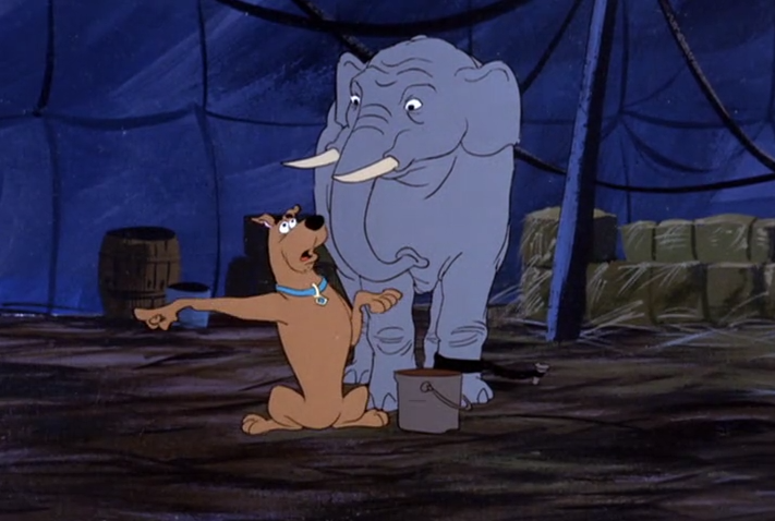  Scooby begged Elliott to throw off his chains, but still his friend refused. Were he to escape, it would be hell to pay for his family. 