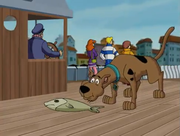 Scooby prepares to “Momma Bird” a hungry fish.