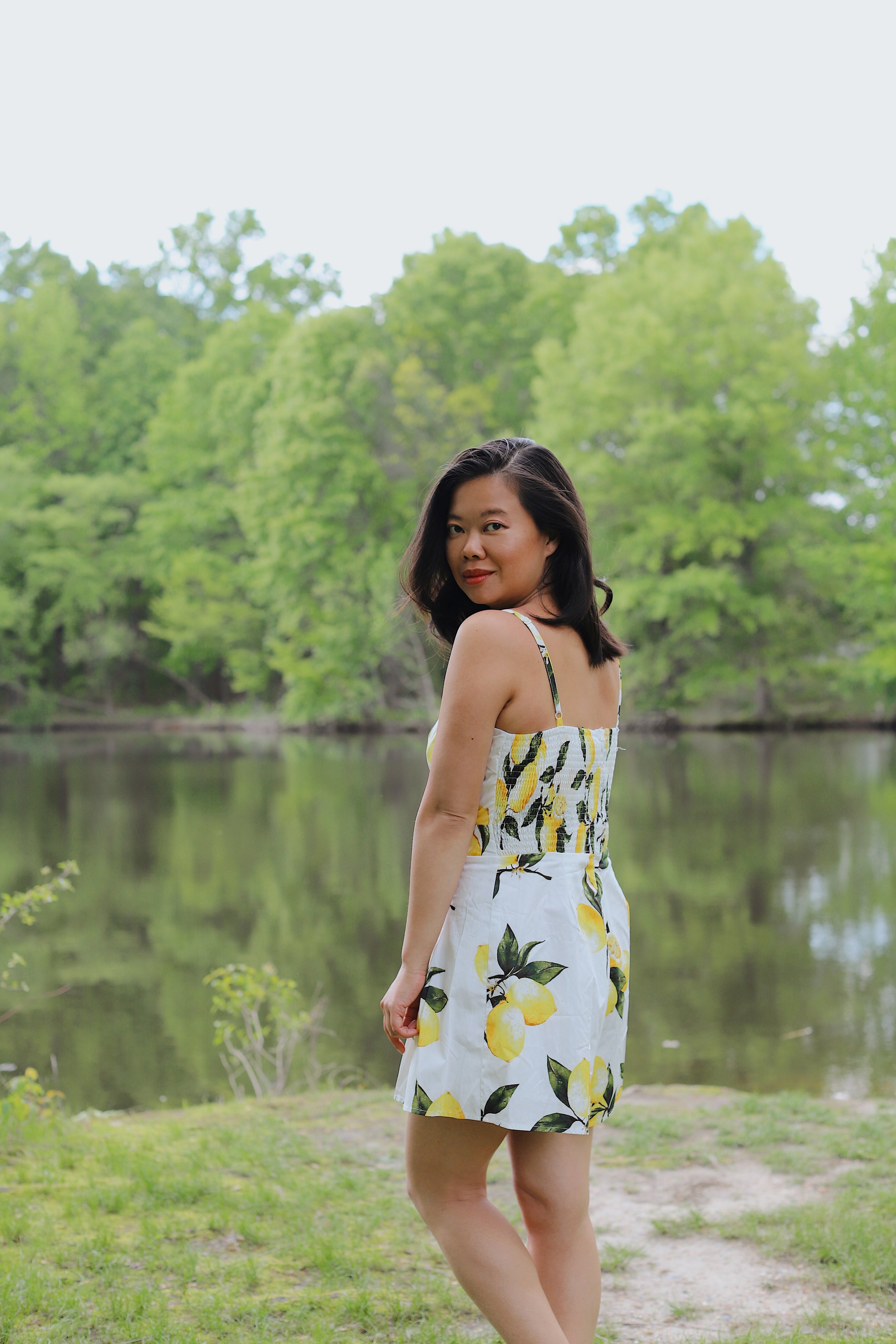 Wearing lemon romper from Bloomingdale’s and Superga sneakers