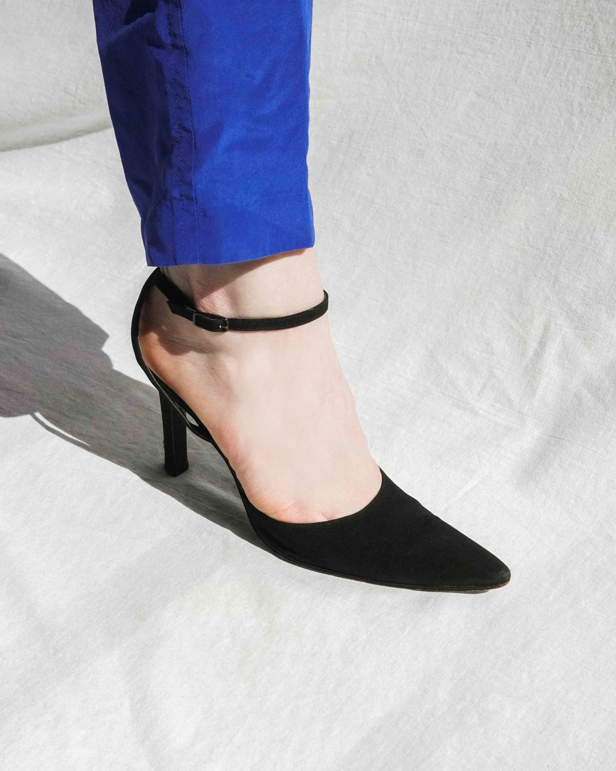 black pointed ankle strap heels