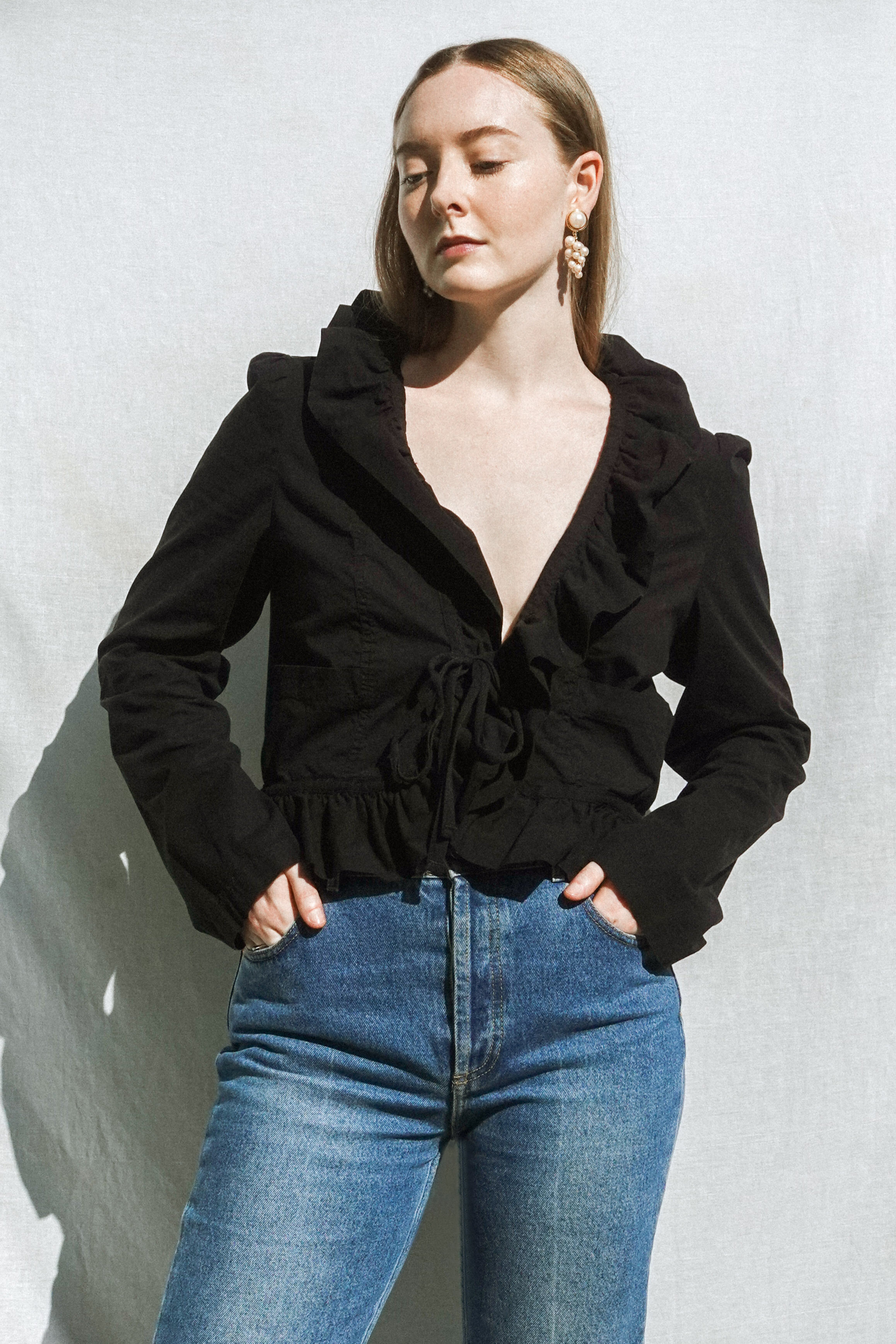 black frilly blouse