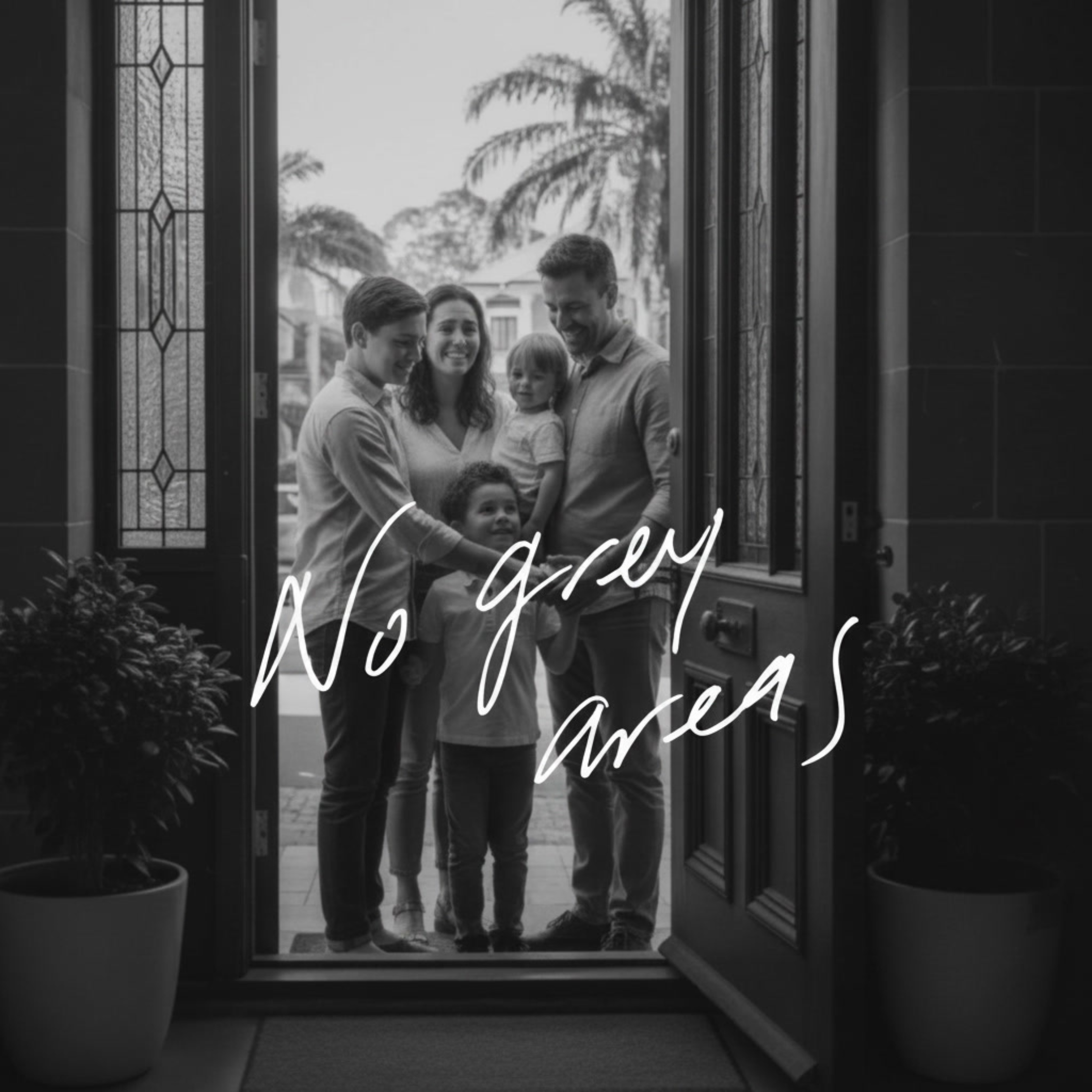 A family of five stands outside a house, seen through a glass door with cursive writing on it. The family includes two adults, two children, and a baby, all smiling and looking cheerful. The background shows trees and a residential neighborhood.