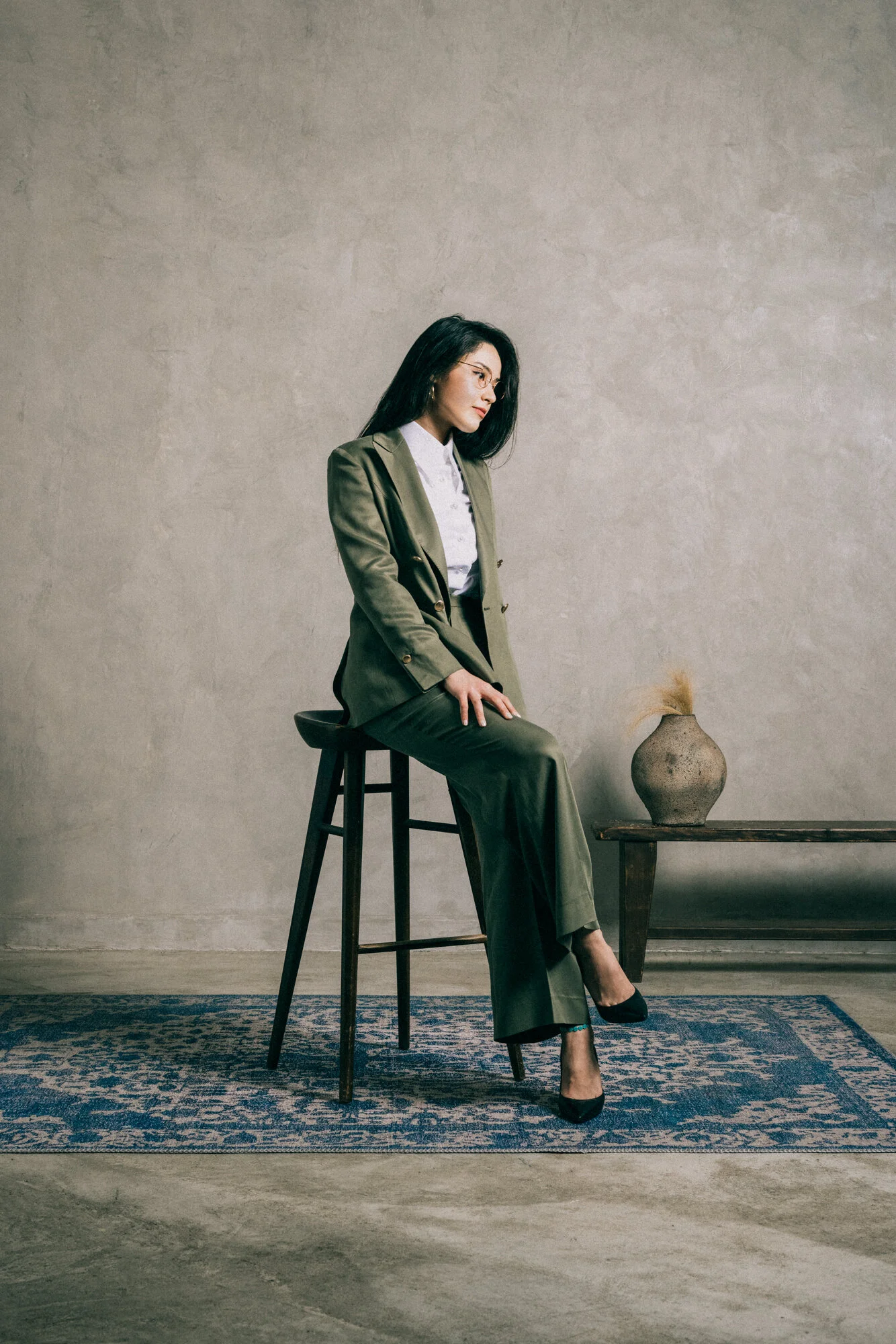 Model wearing our Signature DB Jacket with Flare Trousers, made of recycled Tencel-Viscose Twill