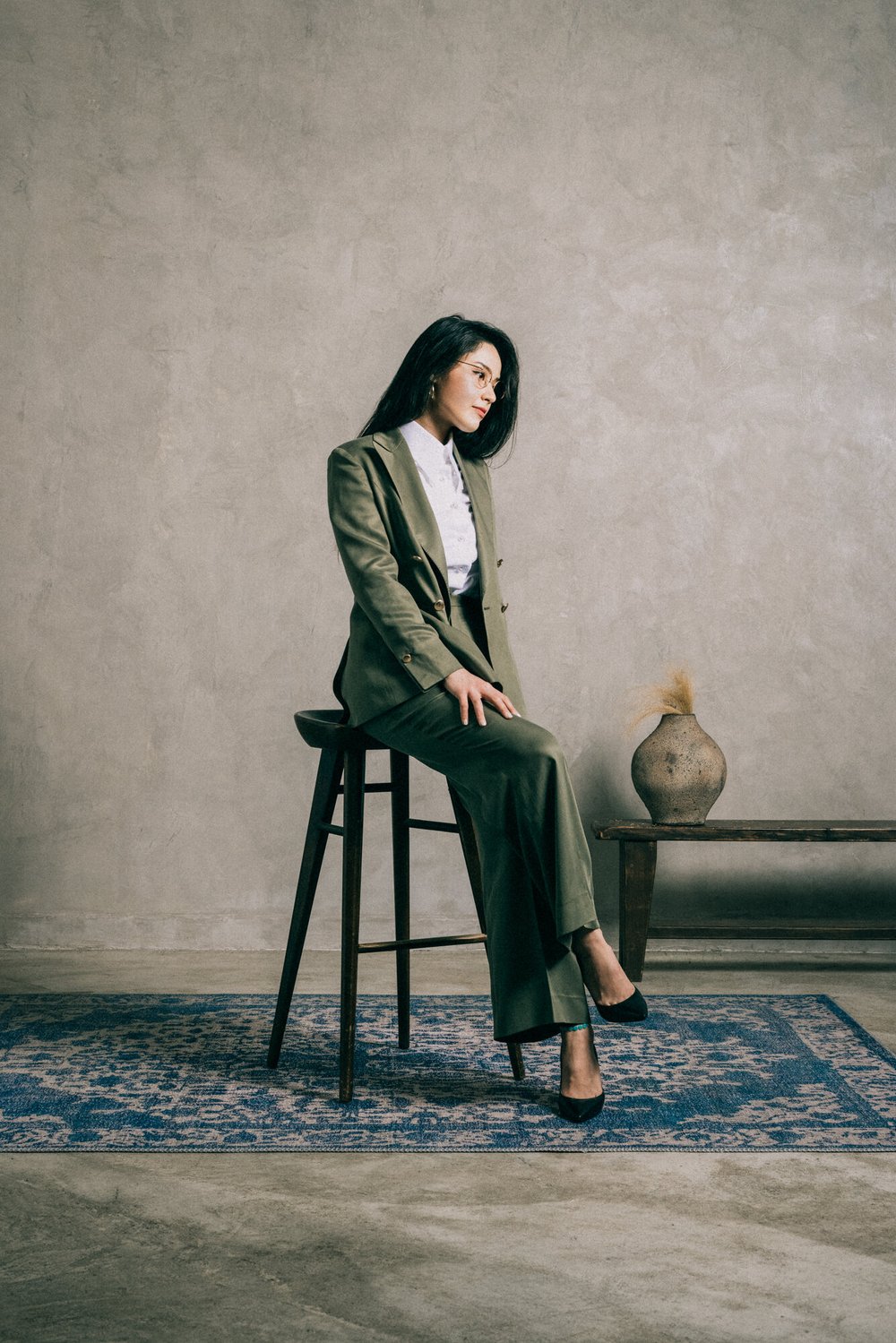 Model wearing our Signature DB Jacket with Flare Trousers, made of recycled Tencel-Viscose Twill