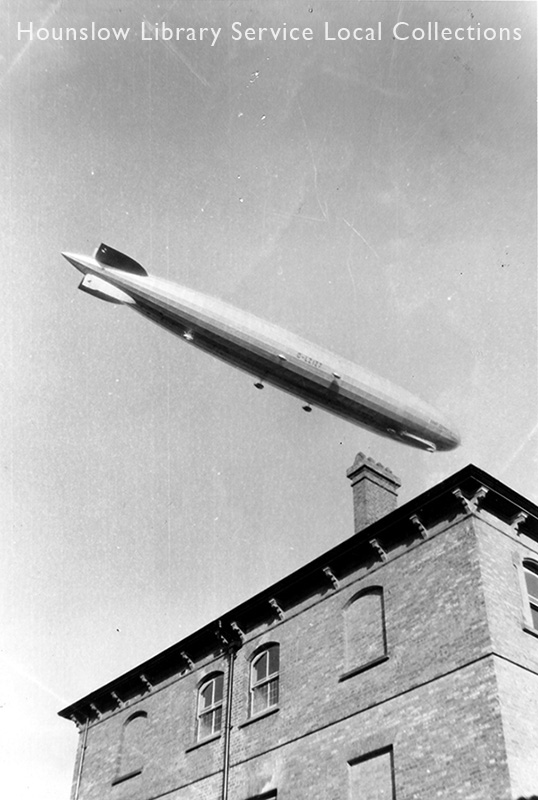 1932---Graf-Zepplin-Departing-Above-Tudor-Court.jpg