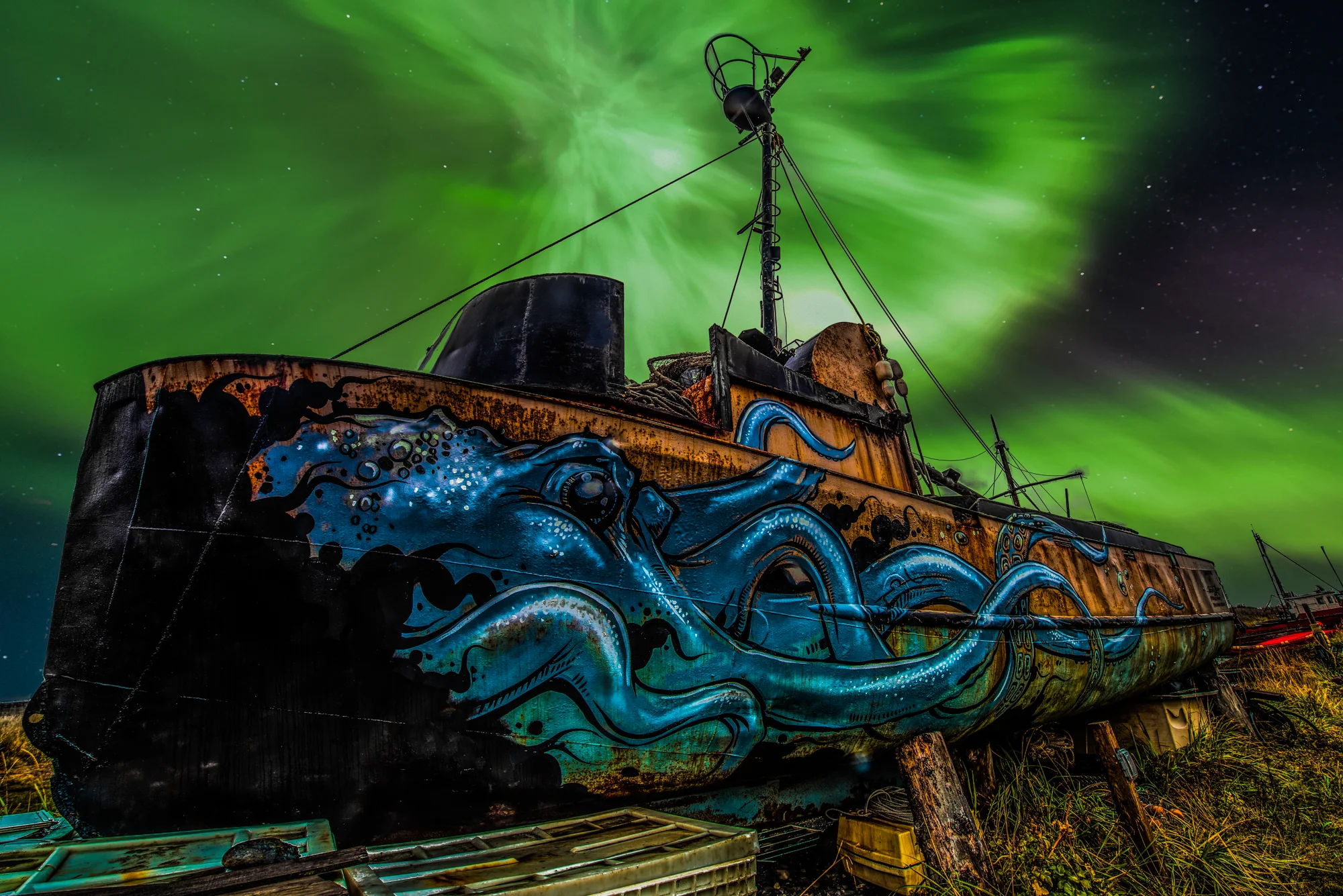 I photographed this abandoned ship in Homer, AK and I combined it with a northern lights photo I took the first night of my trip to make this powerful composite image.