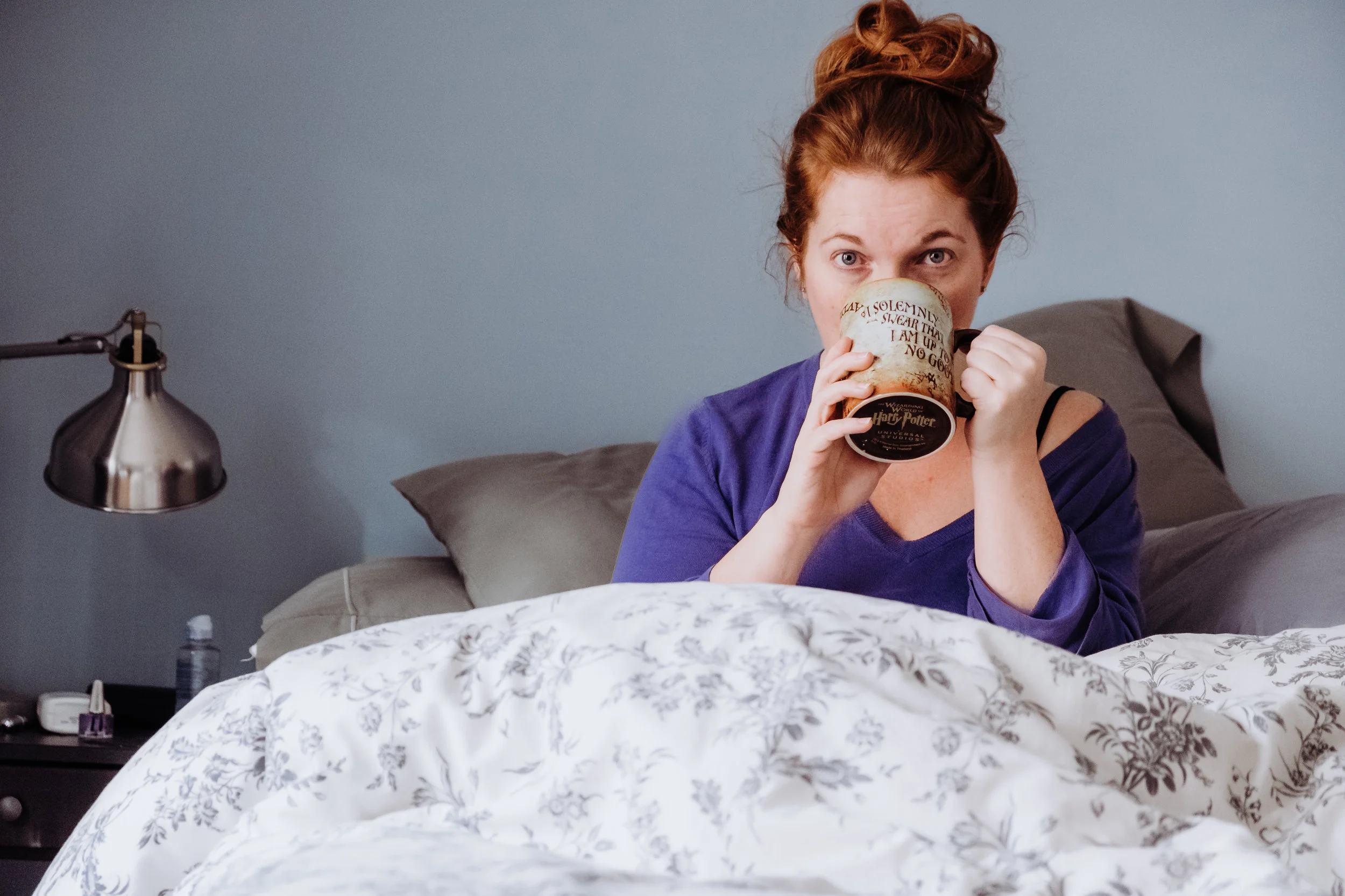 No time for professional headshots in my insane life! So, here I am, in my natural state! Chilling on a Saturday morning, having coffee from my Harry Potter mug...because growing up is for suckers!