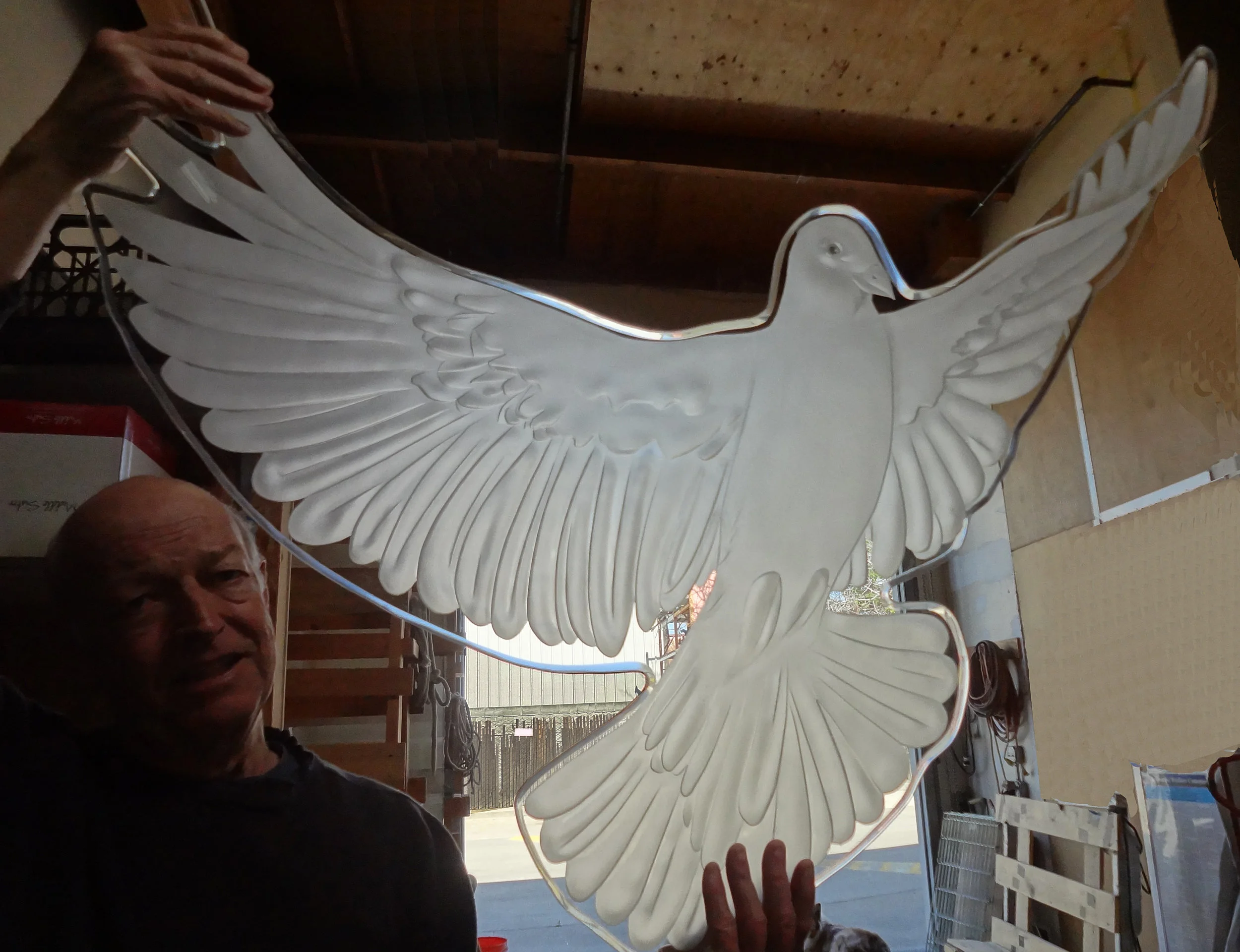 deeply carved dove