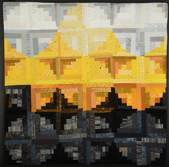 One of Katie PM's artful log cabin quilts, "Granada Sunset"
