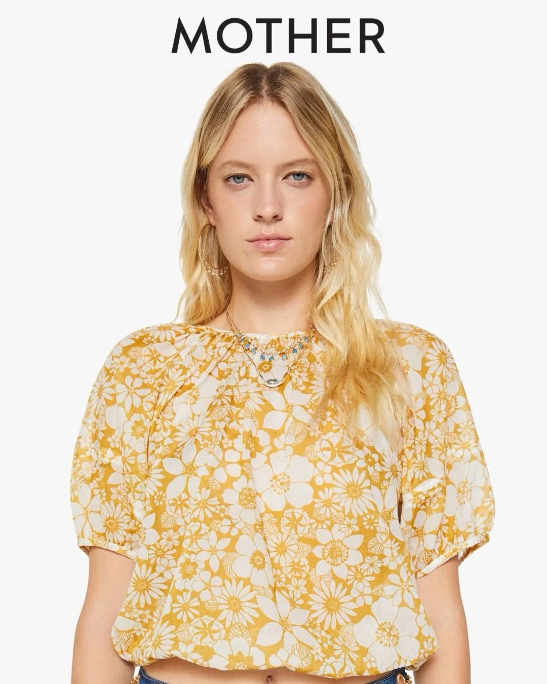 New From MOTHER! The Party In The Back Shirt. A Lightweight Blouse With Balloon Sleeves And An Open Back That Ties. 100% Cotton.