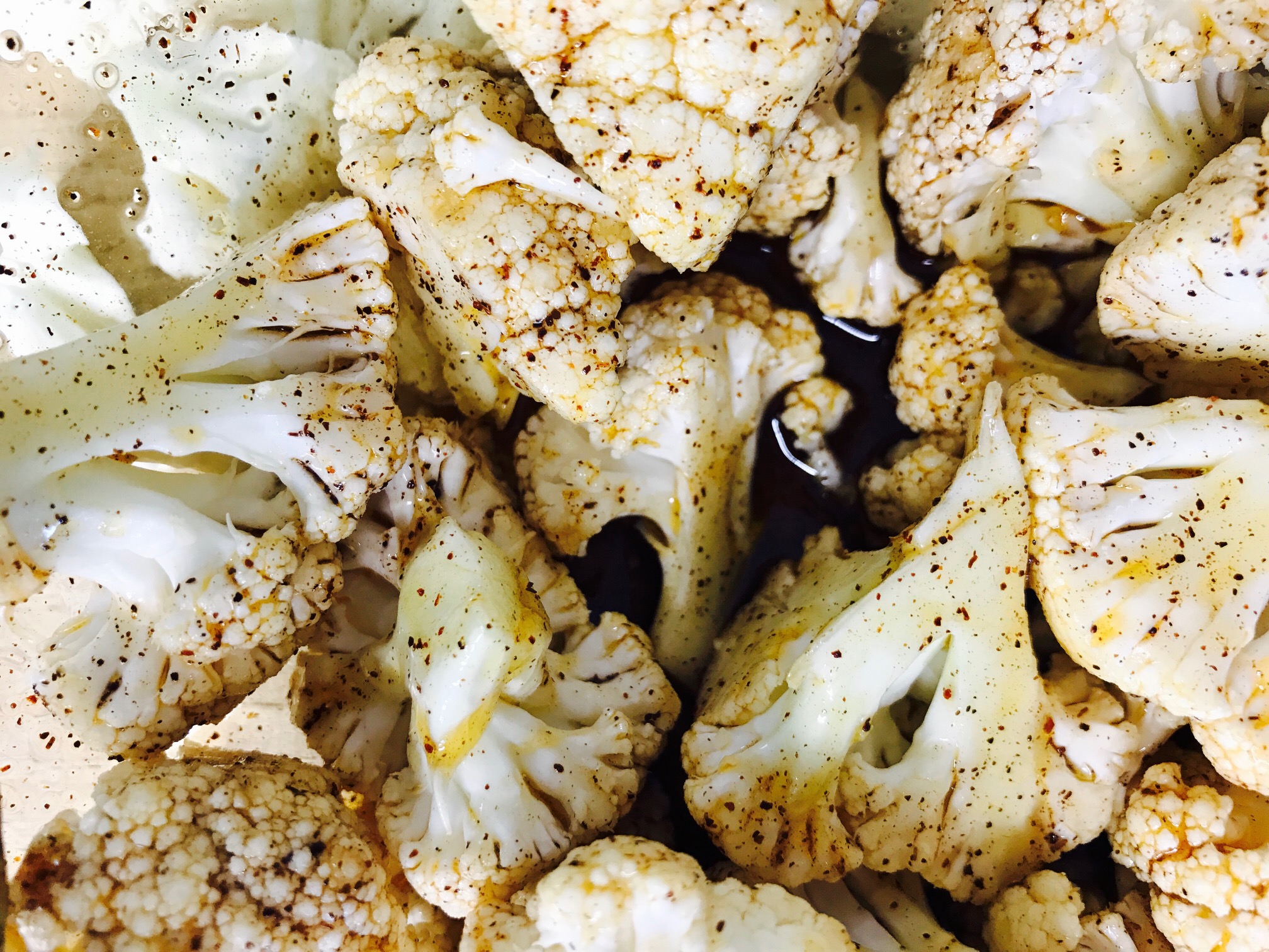 Spicy cauliflower! A little olive oil, chili pepper, salt and pepper! That's it!!