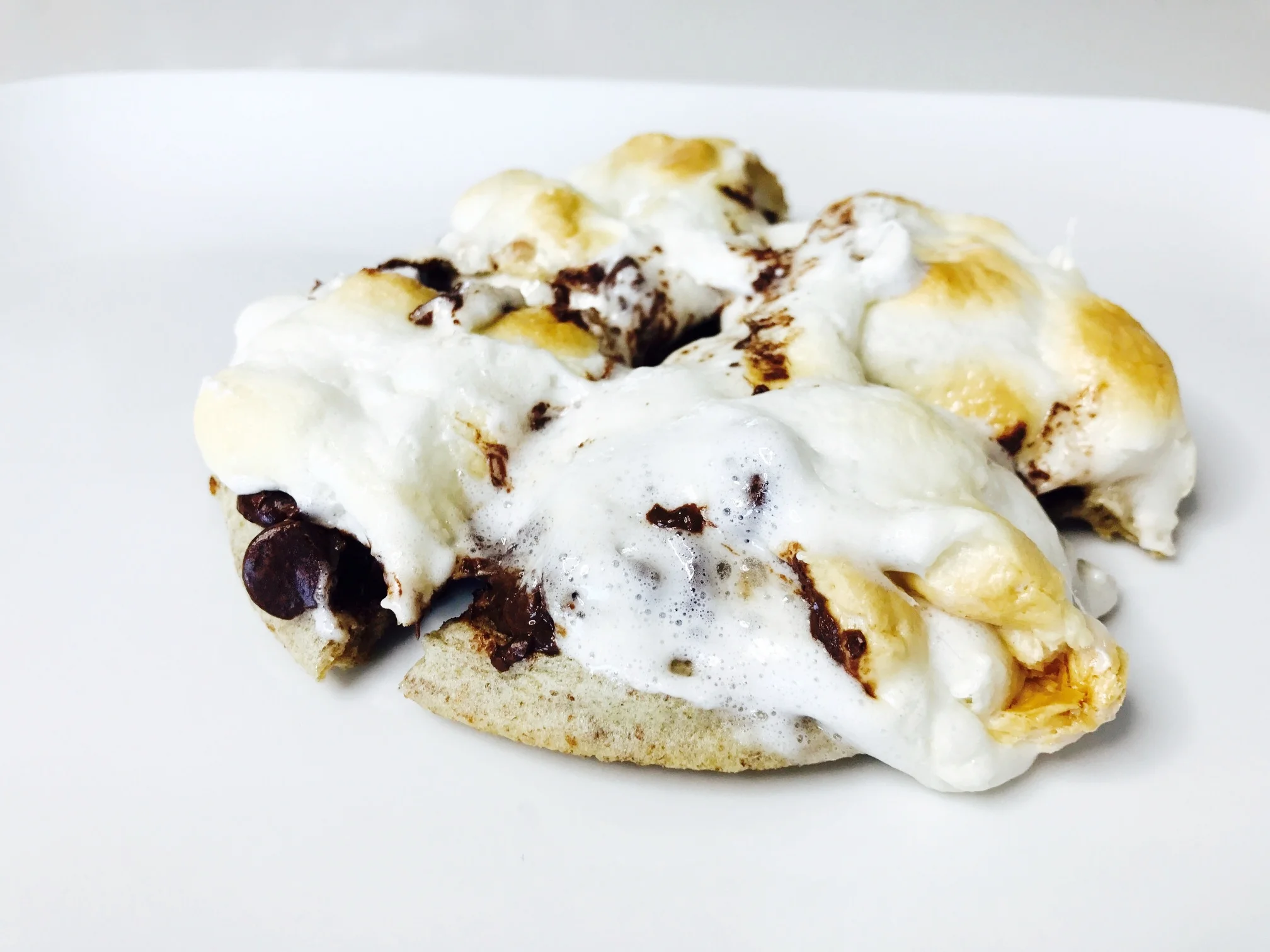 The chocolate chips and marshmallows melt perfectly into the waffle. Cut the waffle into four triangles - and serve right away! 