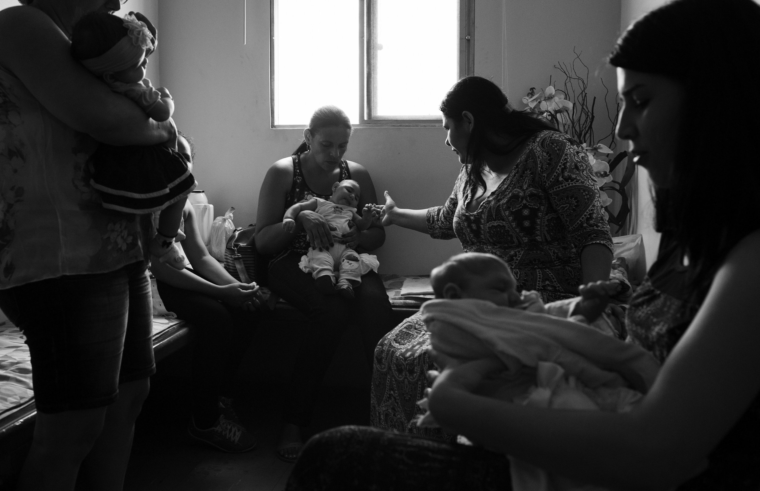  The wait is long for physiotherapy appointments for babies with microcephaly, so in the hallway outside of the therapy room, mothers gather and share coffee, cake and news about their babies. The hospital has become a refuge for families, a place wh