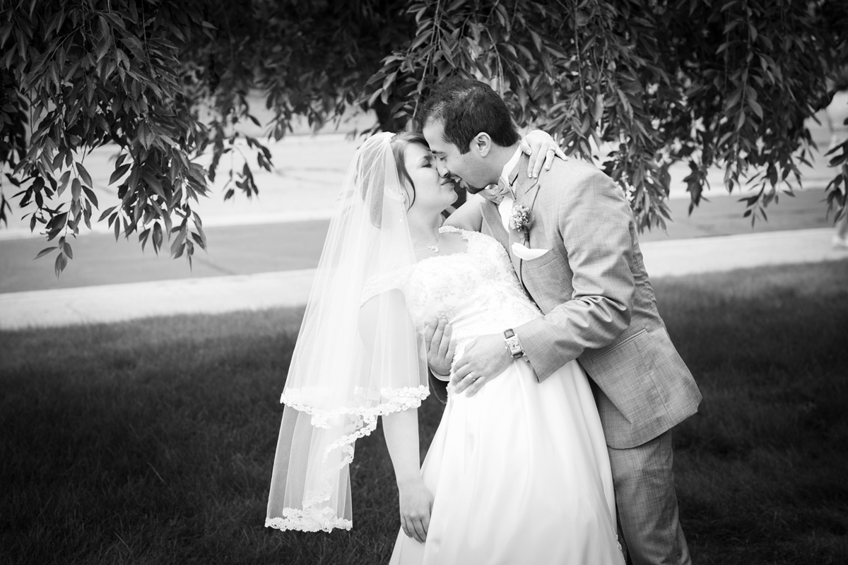 Spring Lake-Presbyterian Church-Bride-Groom-Dip-Kiss-Wedding-Lakeshore-Grand Haven-Michigan-West Michigan-Muskegon-Black and White.jpg