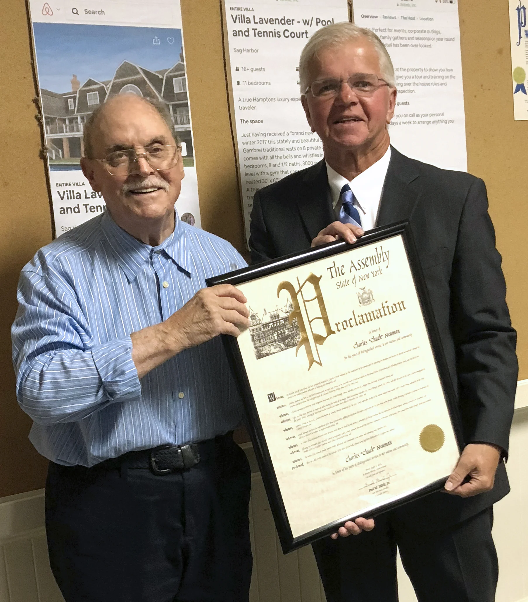 Charles Neuman receives proclamation from Assemblyman Fred Thiele