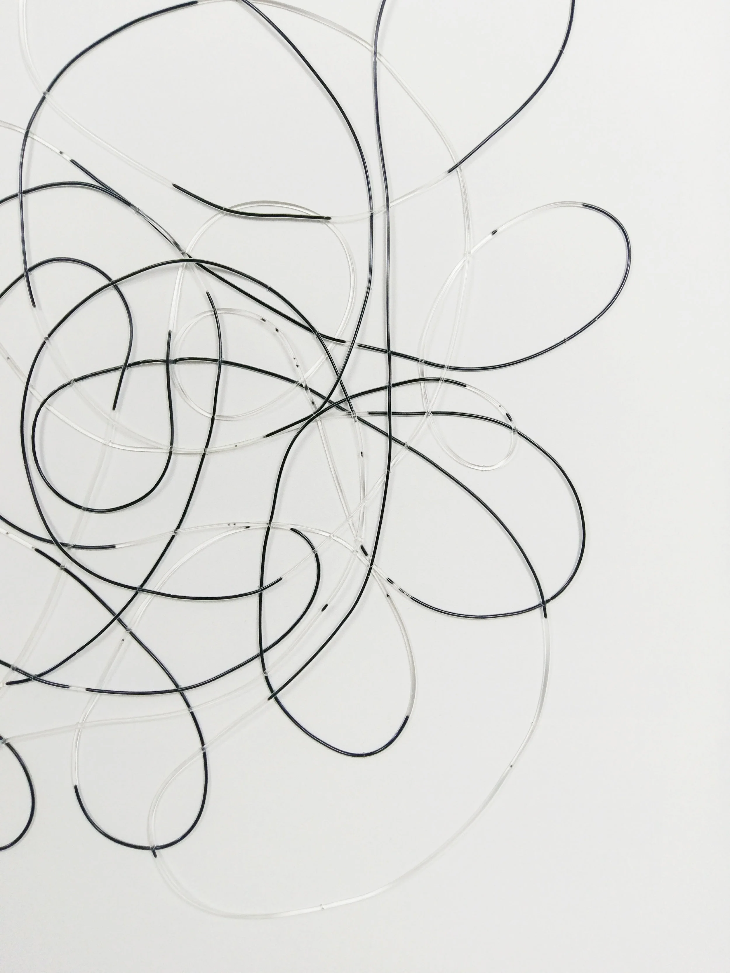 The drawing generates a mix of long, looping lines and short, staccato marks