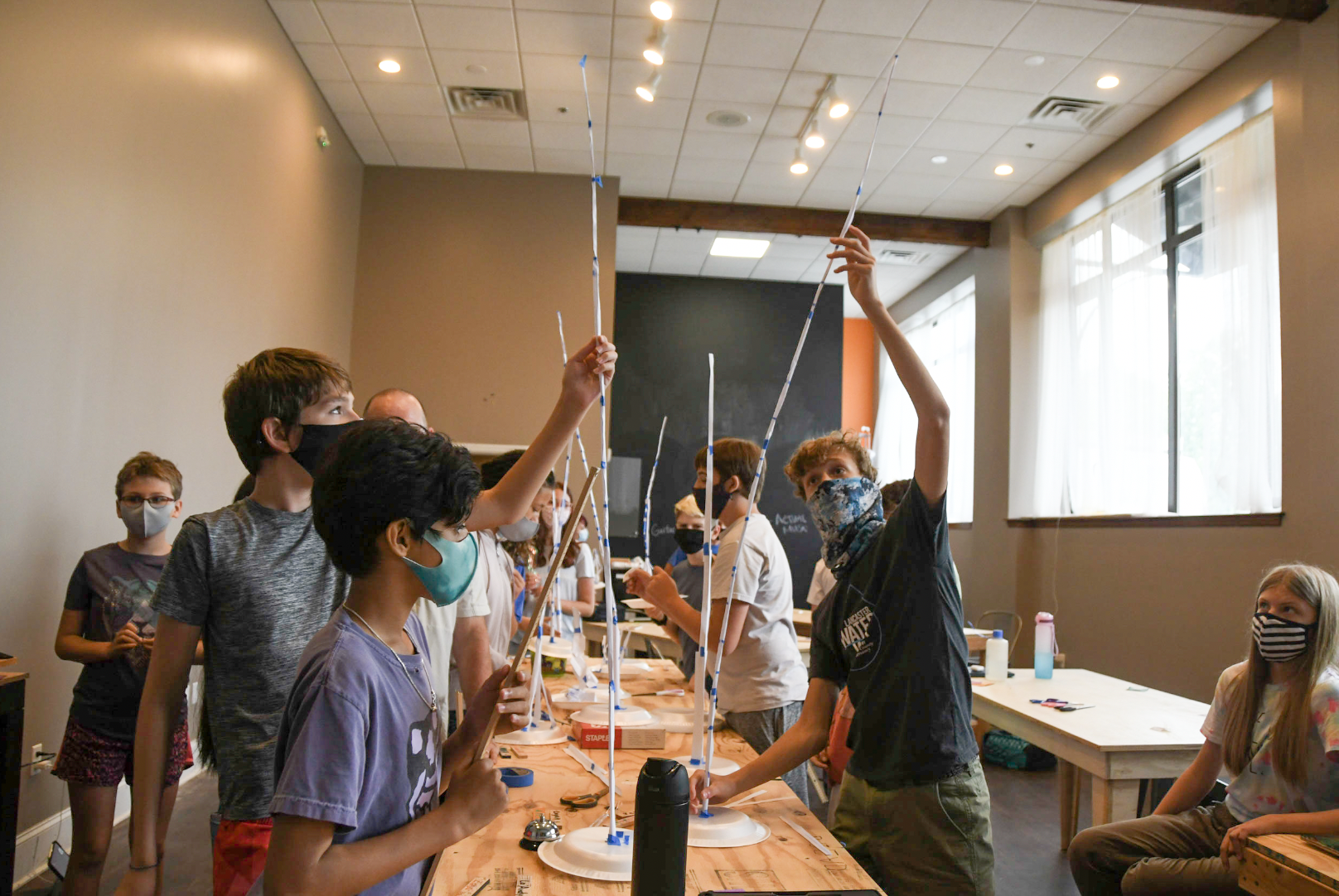 Middle School students participate in an experiential tower-build exercise.