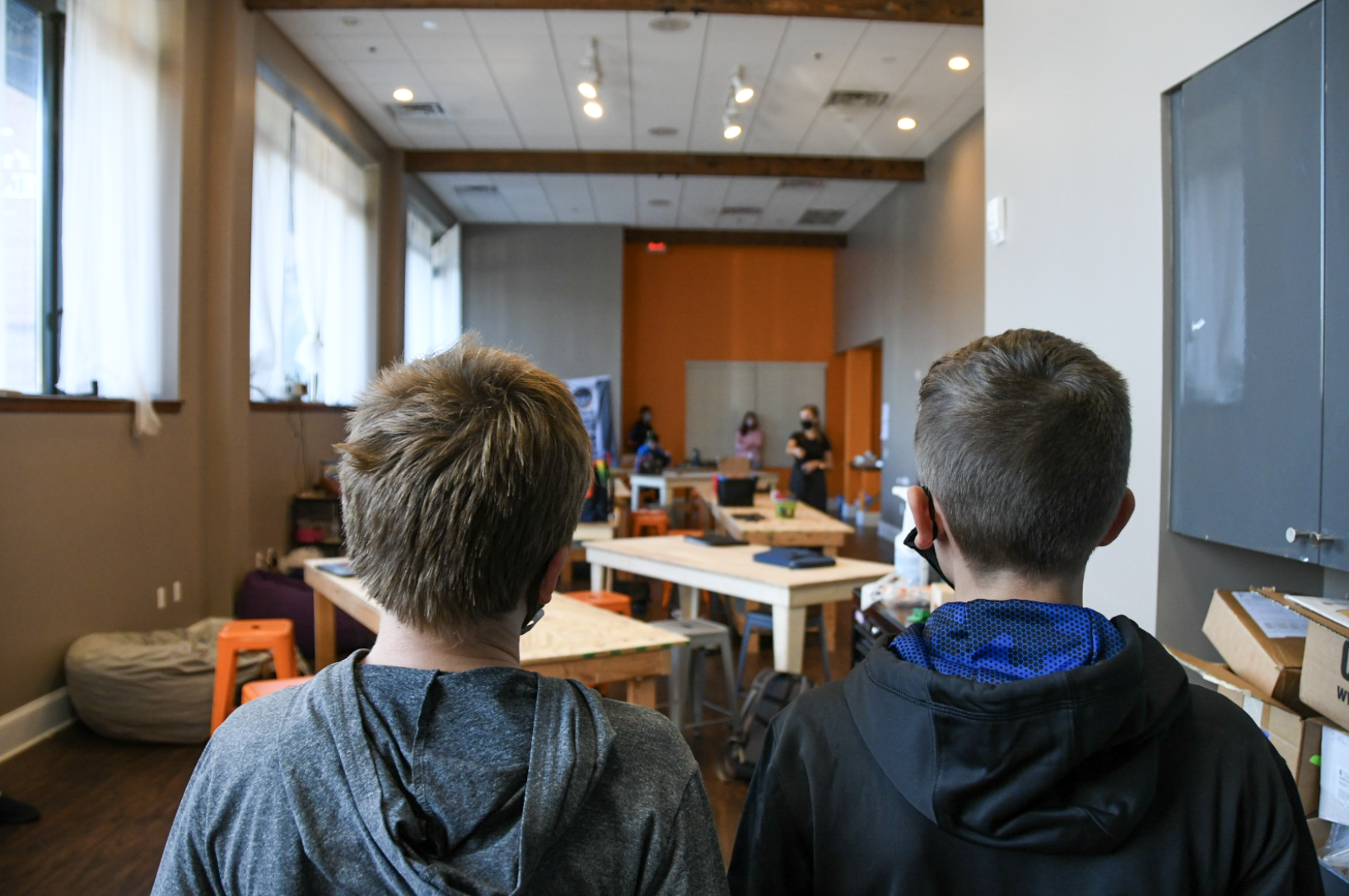 8th grade students participate in an improv theatre exercise.
