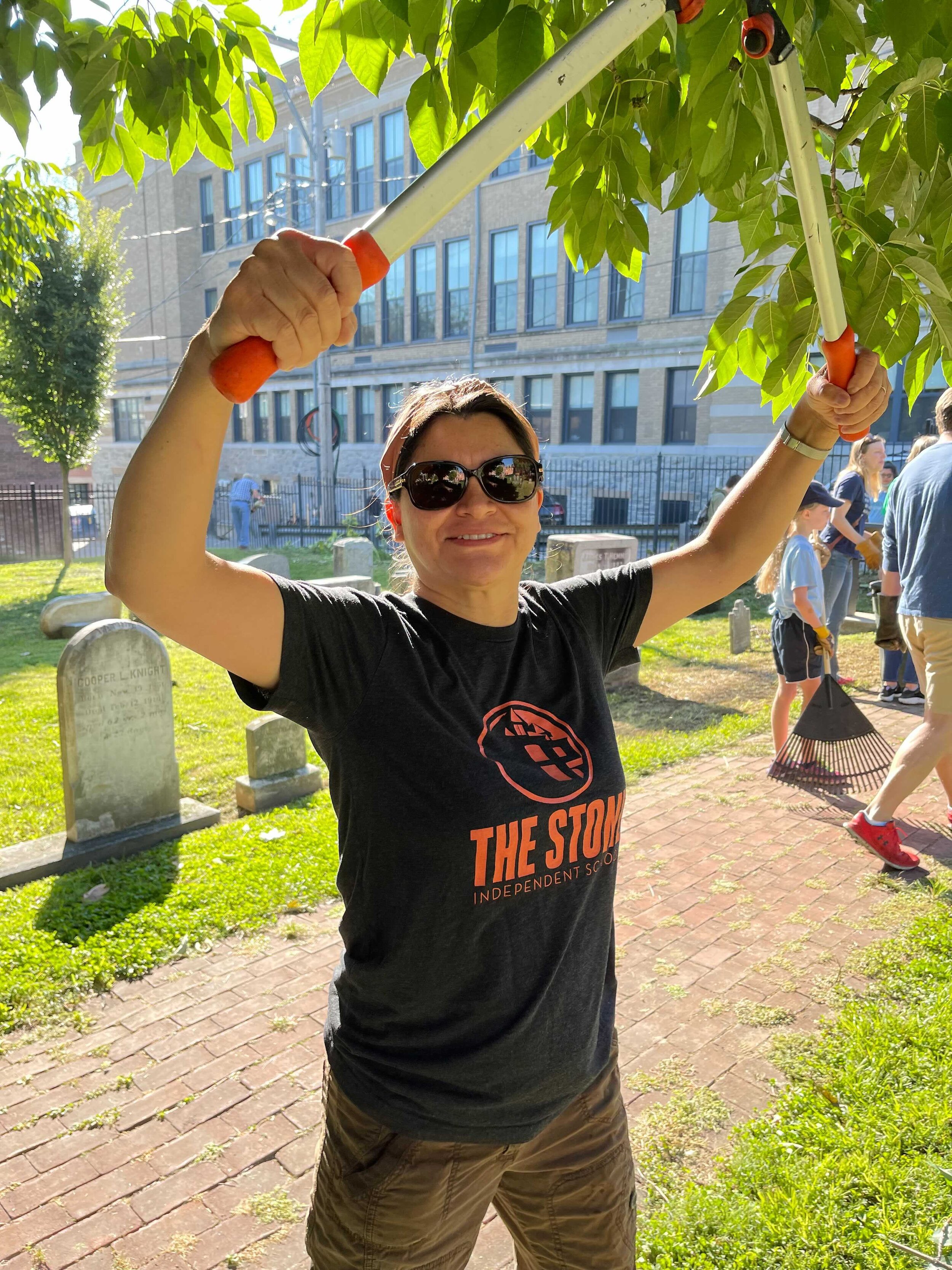 House Levengood leader Maribel Perez works at the Shreiner-Concord cemetary clean-up.