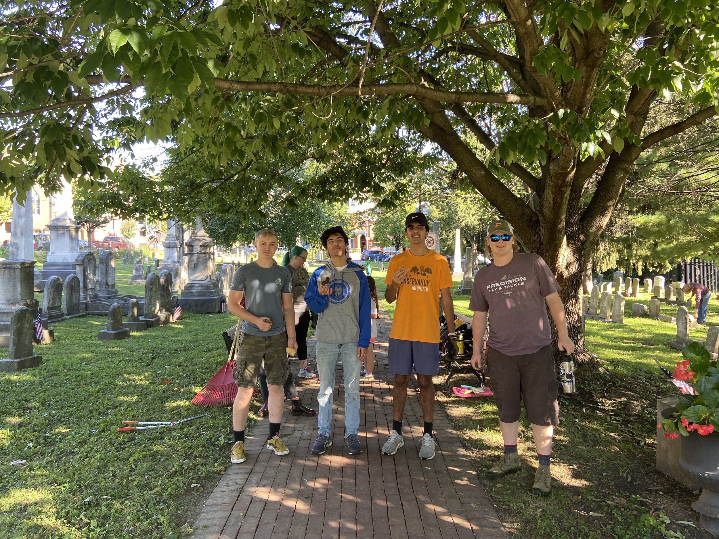 Members of House Levengood spend Saturday morning helping to clean up Shreiner-Concord cemetery in downtown Lancaster.
